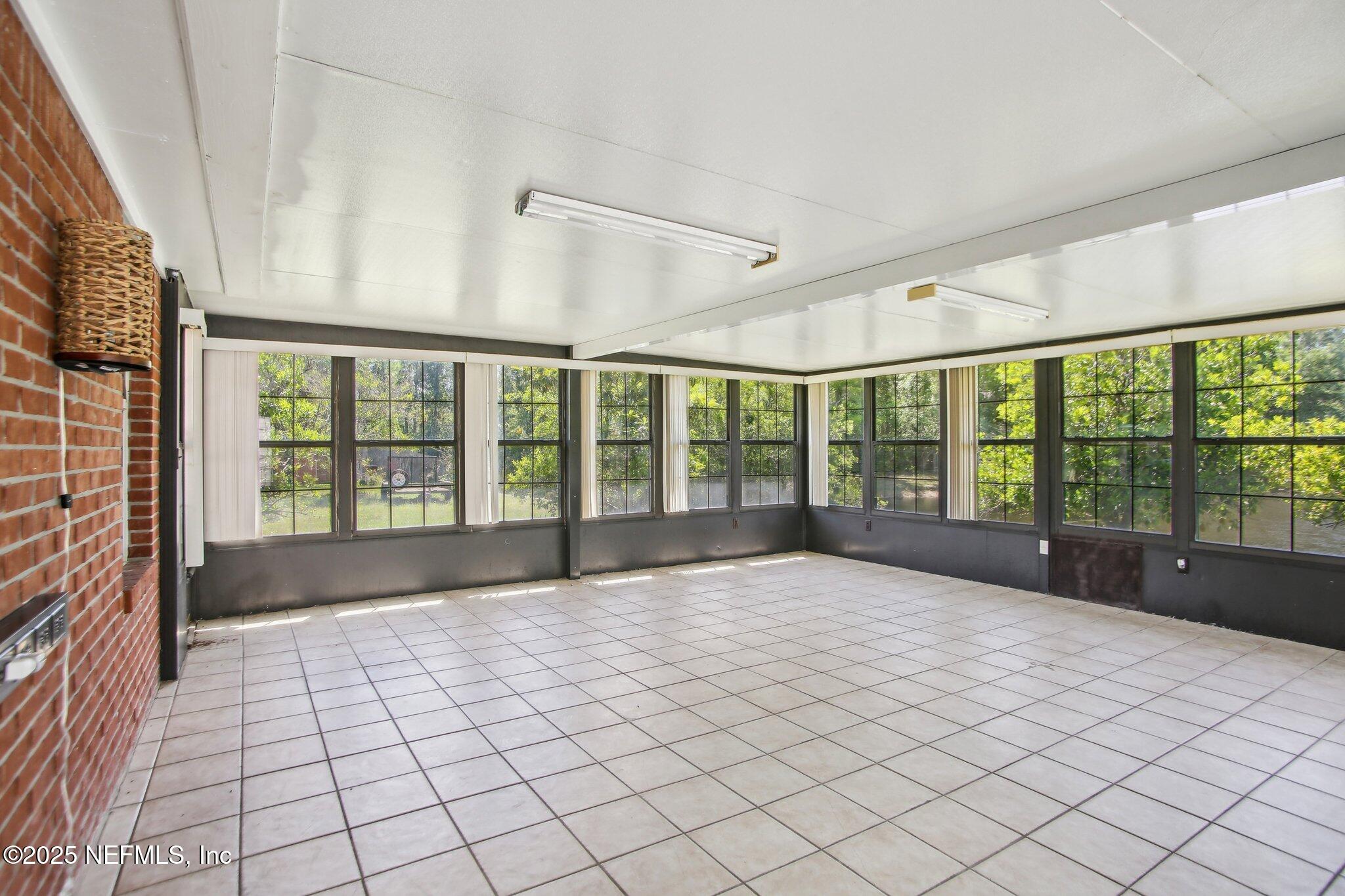1634 Dockside Drive Fleming Island, FL 32003 - Photo 38 of 44 a view of an empty room with a large window