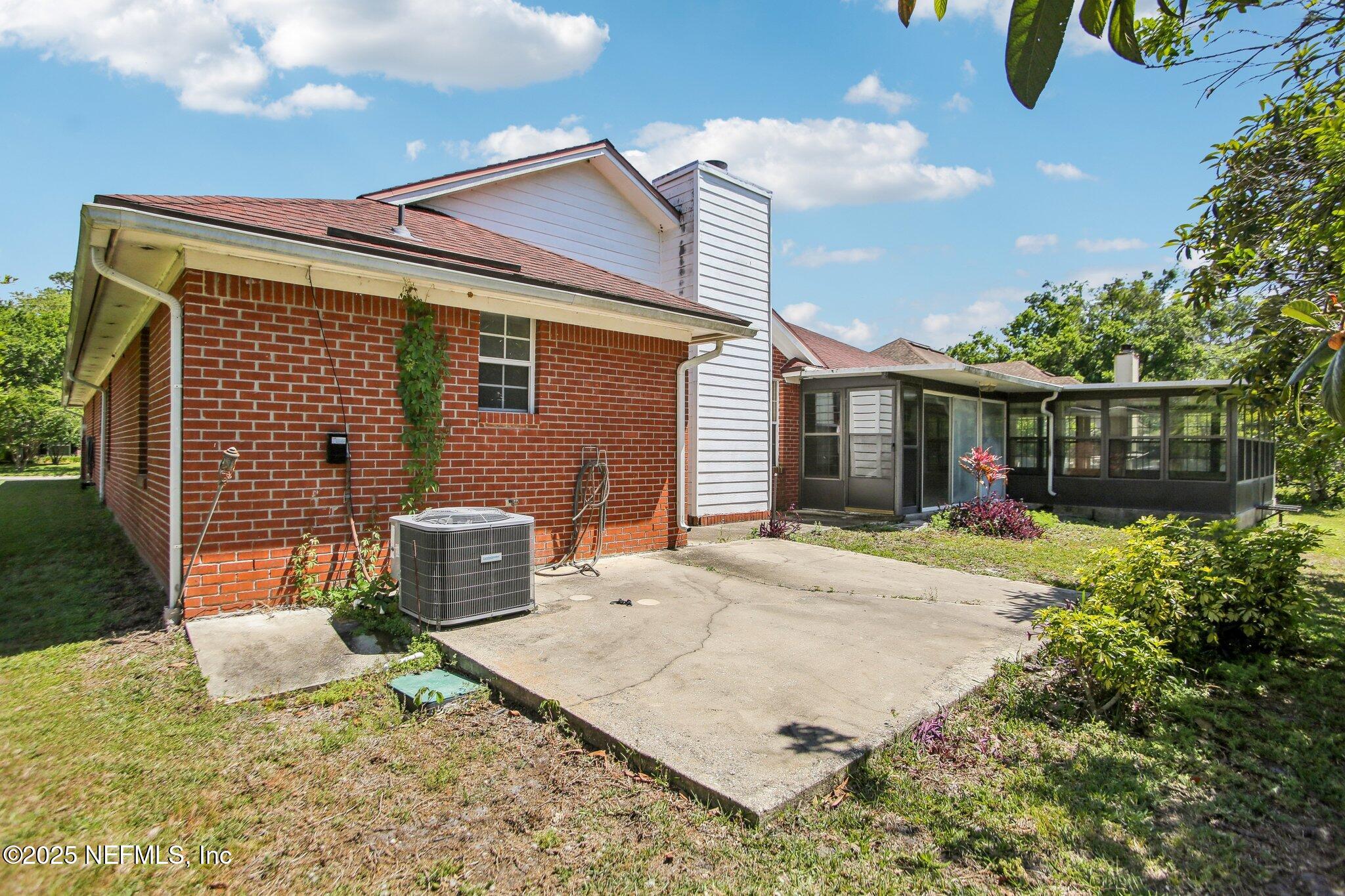 1634 Dockside Drive Fleming Island, FL 32003 - Photo 42 of 44 front view of a house with a yard