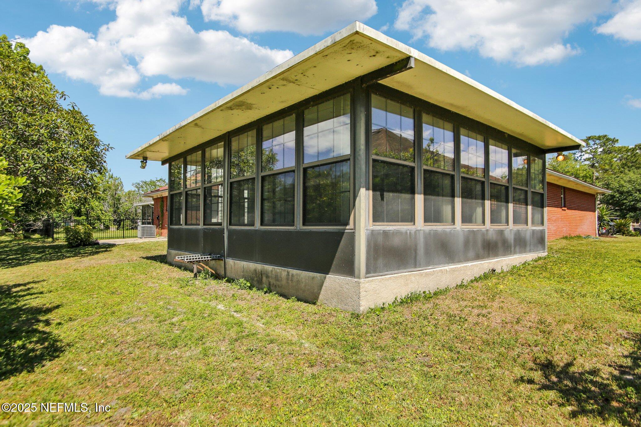 1634 Dockside Drive Fleming Island, FL 32003 - Photo 43 of 44 a view of a house with a yard