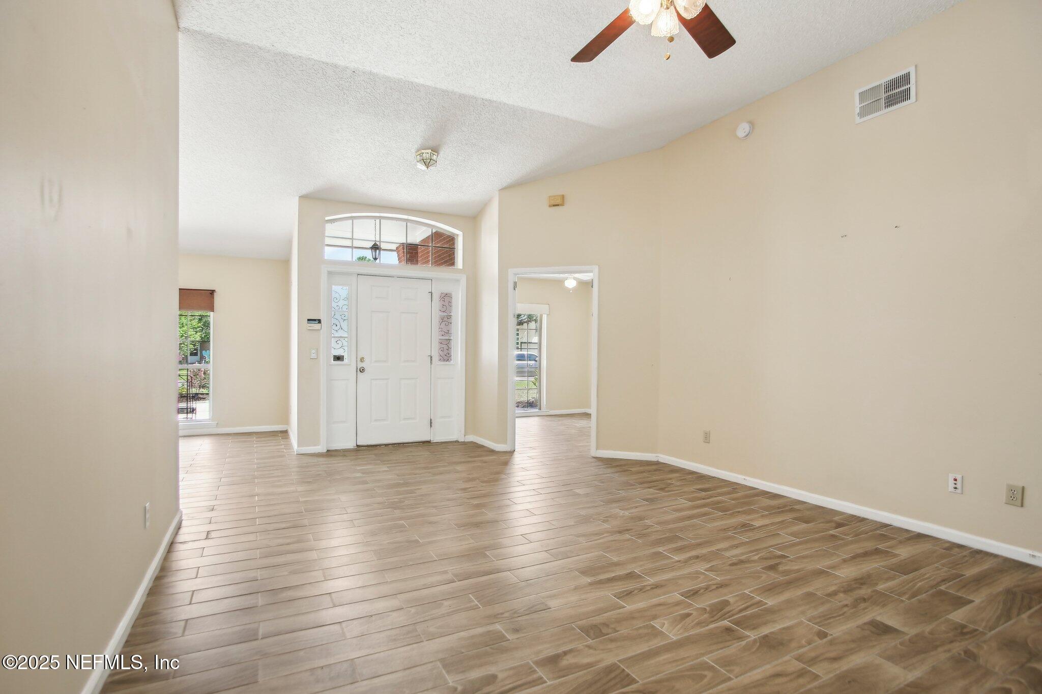 1634 Dockside Drive Fleming Island, FL 32003 - Photo 6 of 44 wooden floor in an empty room