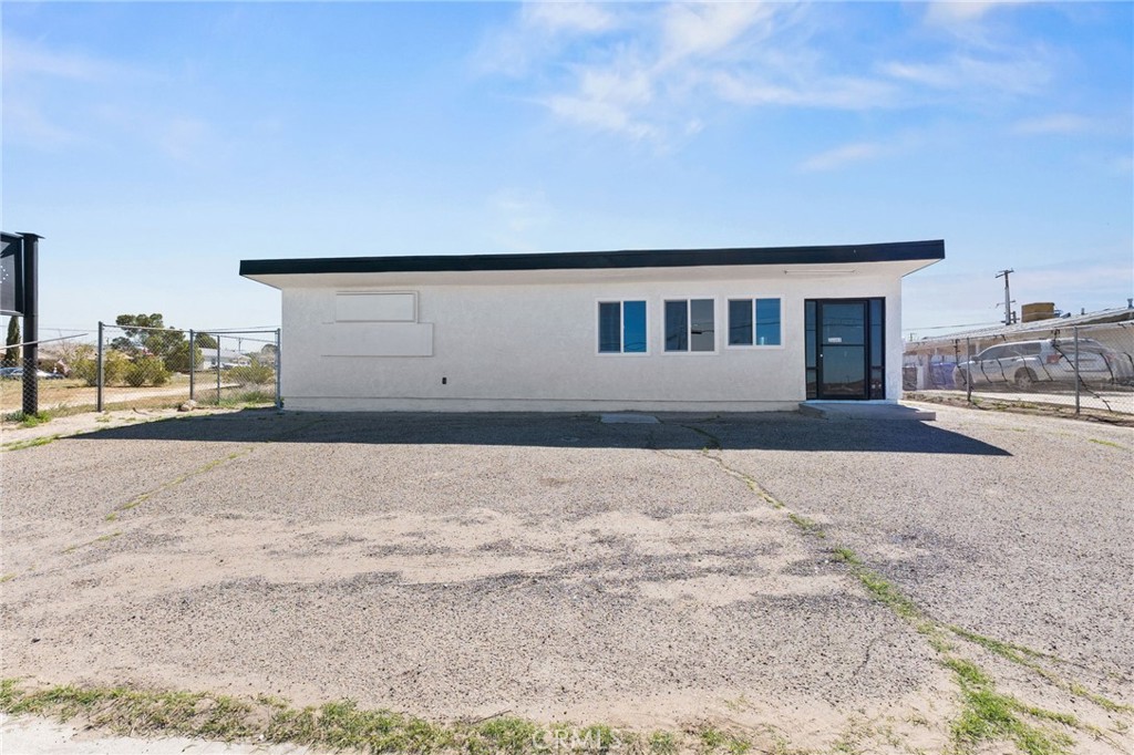 25441 Main Street Barstow, CA 92311 - Photo 4 of 66 a house view with a outdoor space