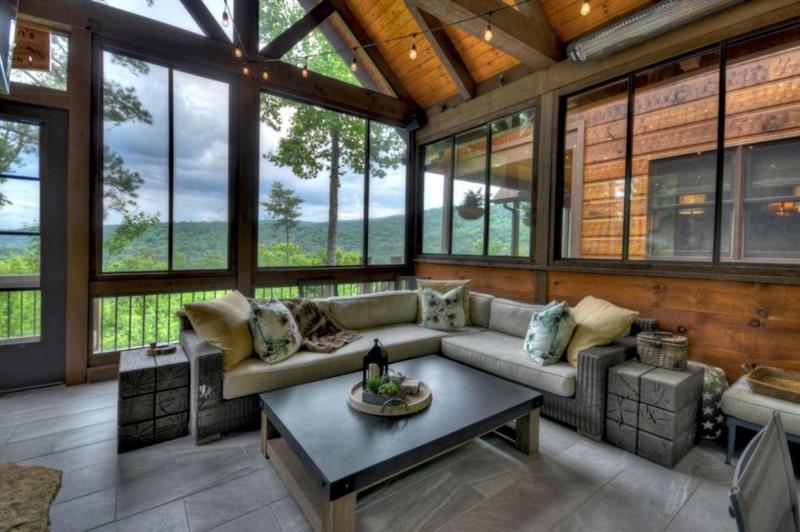 436 Geronimo Road Cherry Log, GA 30522 - Photo 21 of 72 a living room with furniture and a large window