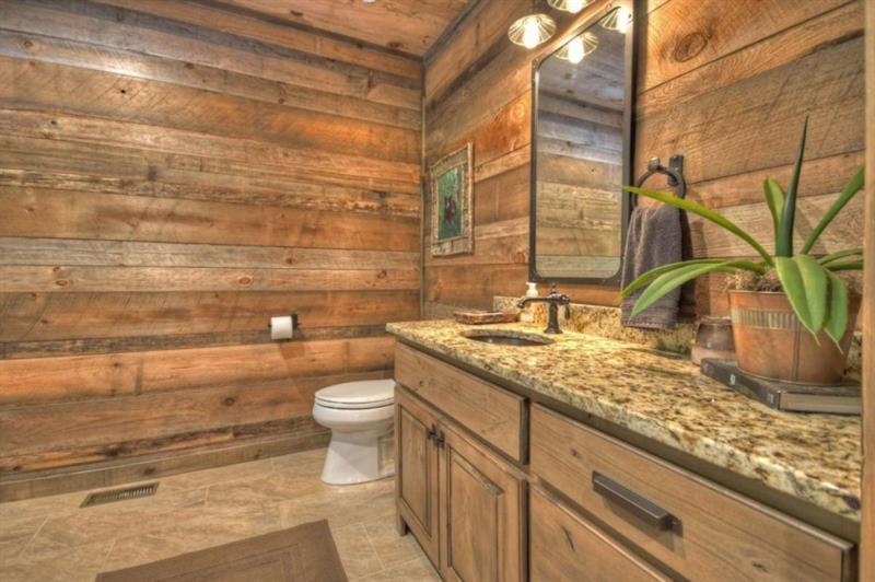 436 Geronimo Road Cherry Log, GA 30522 - Photo 38 of 72 a bathroom with a granite countertop toilet and sink