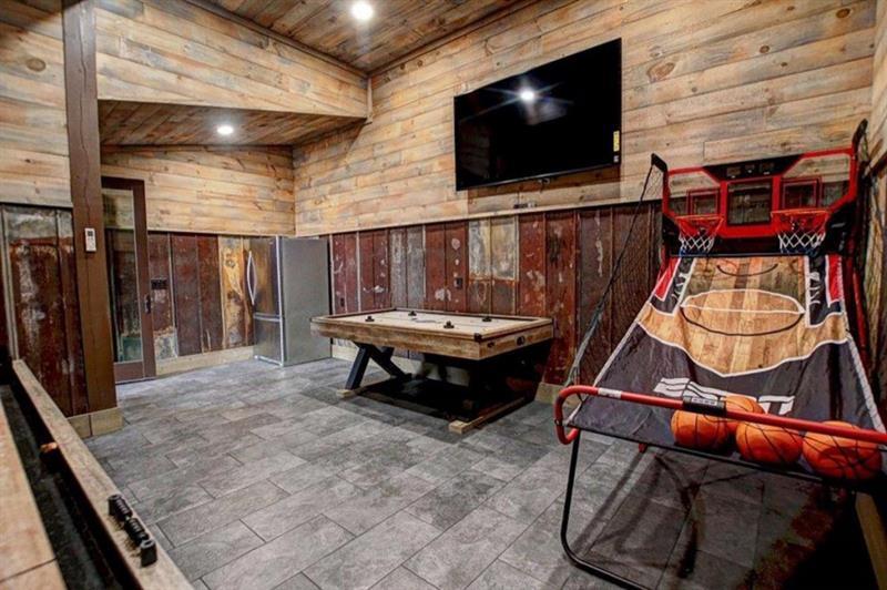 436 Geronimo Road Cherry Log, GA 30522 - Photo 57 of 72 a living room with furniture and a flat screen tv