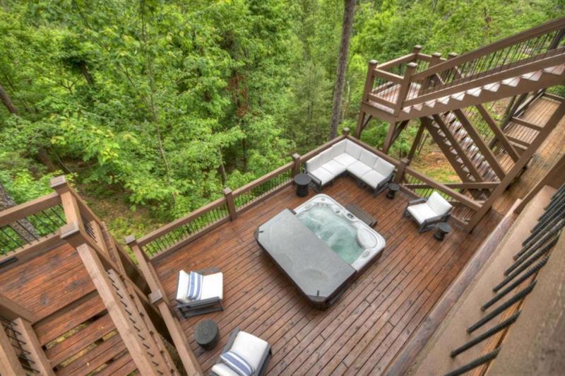 436 Geronimo Road Cherry Log, GA 30522 - Photo 61 of 72 a wooden bench sitting on top of a wooden deck