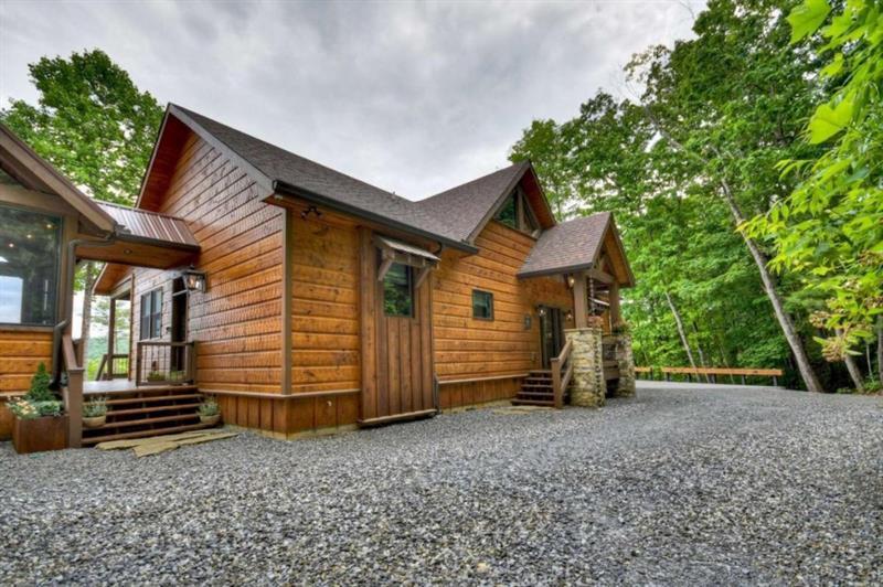436 Geronimo Road Cherry Log, GA 30522 - Photo 68 of 72 a view of a house with a backyard and wooden fence