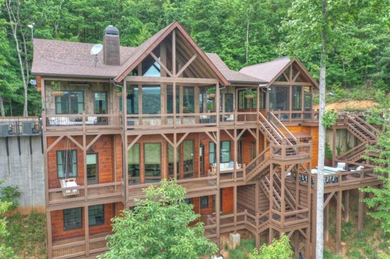436 Geronimo Road Cherry Log, GA 30522 - Photo 71 of 72 a view of a house with a yard and potted plants