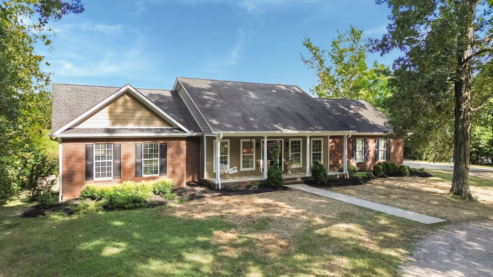 front view of a house with a yard
