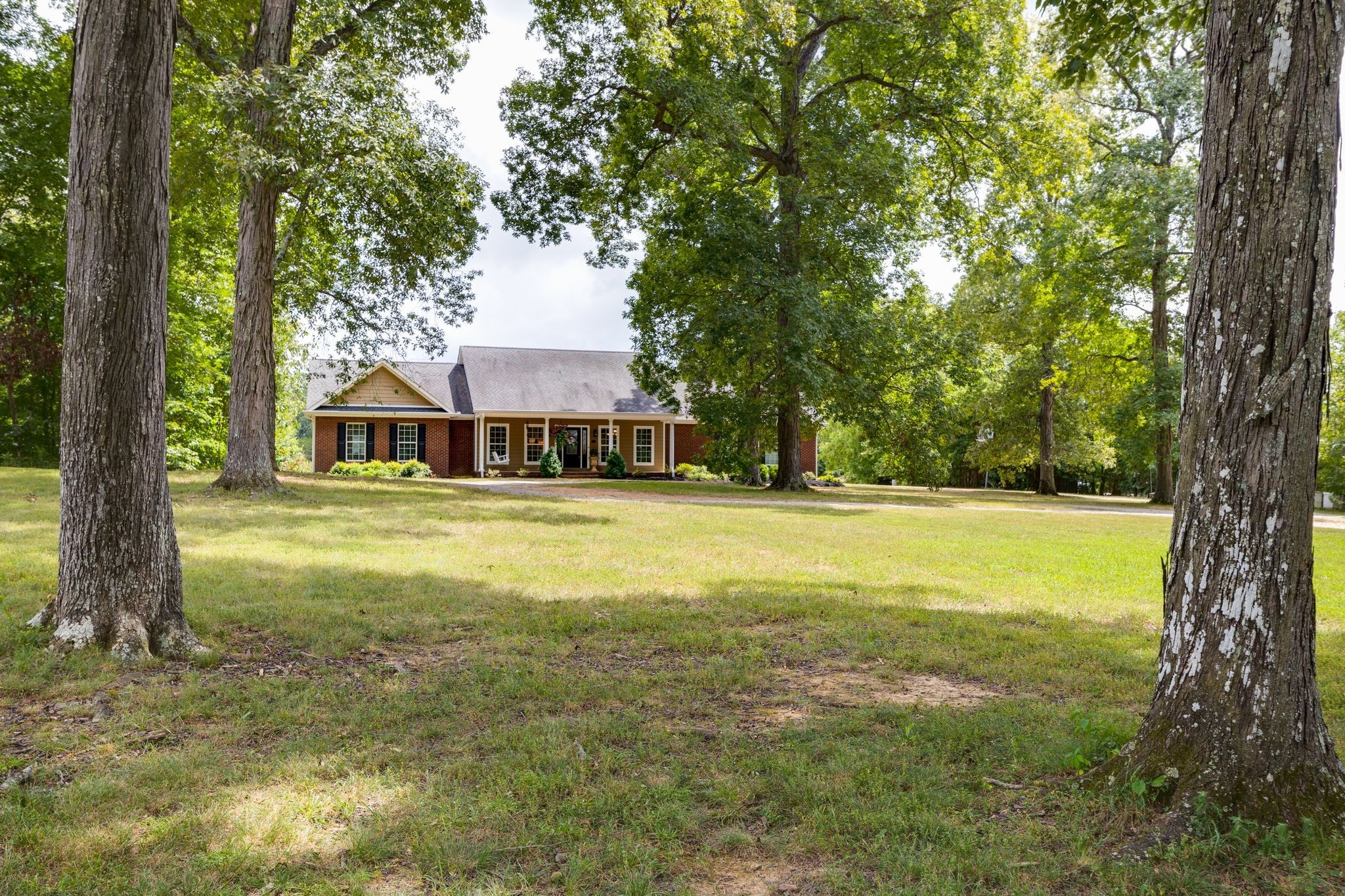 2350 Joe Brown Road Spring Hill, TN 37174 - Photo 13 of 80 a house view with swimming pool in front of it