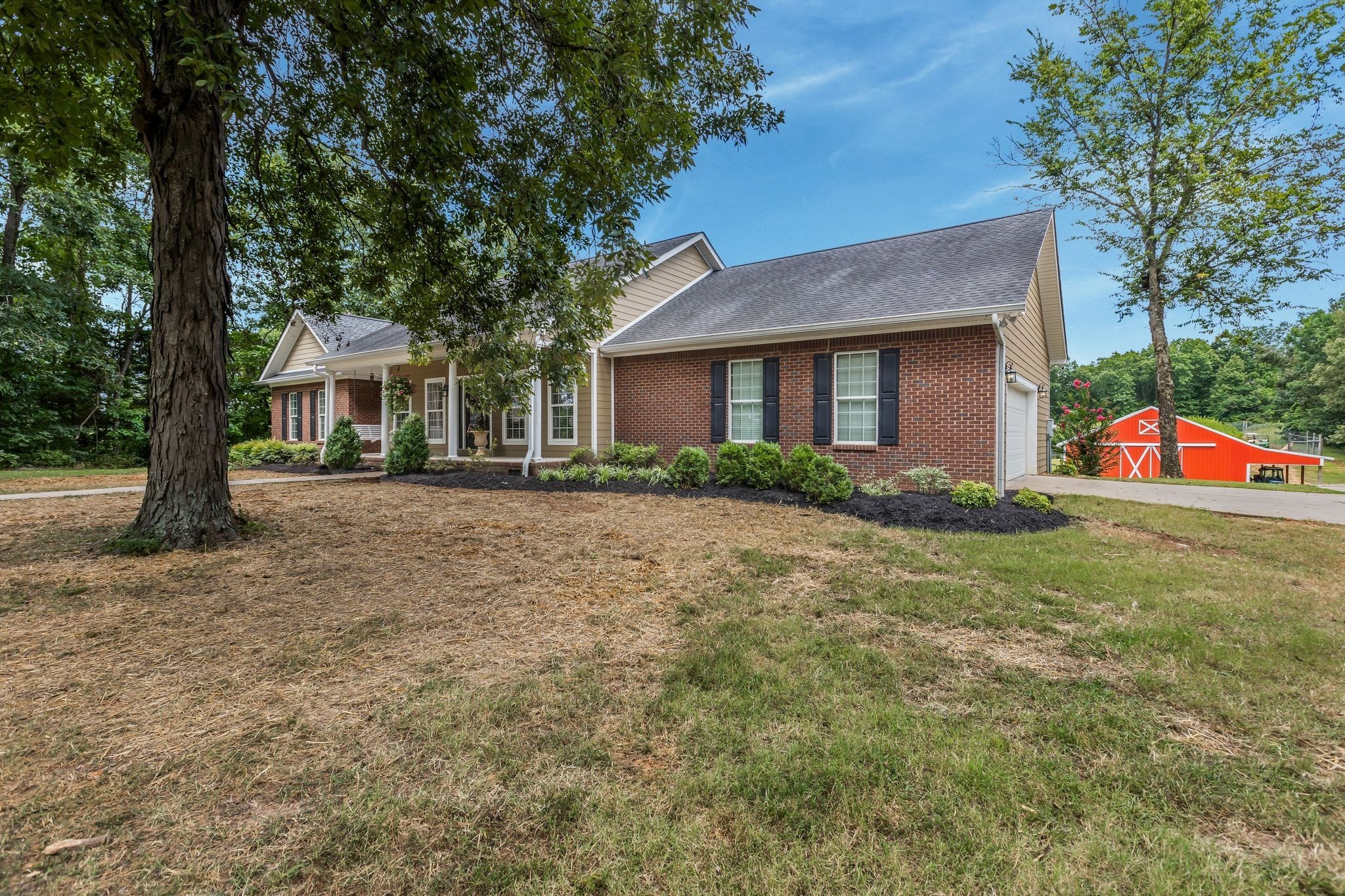 2350 Joe Brown Road Spring Hill, TN 37174 - Photo 18 of 80 a front view of house with yard and trees around