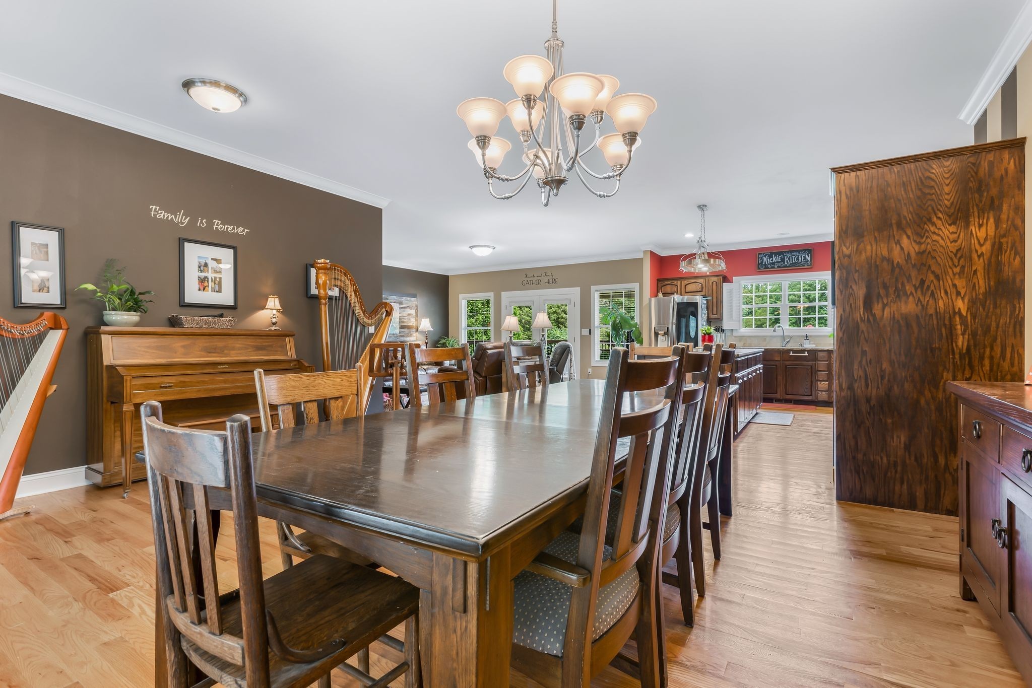 2350 Joe Brown Road Spring Hill, TN 37174 - Photo 24 of 80 a view of a dining room with furniture wooden floor and chandelier