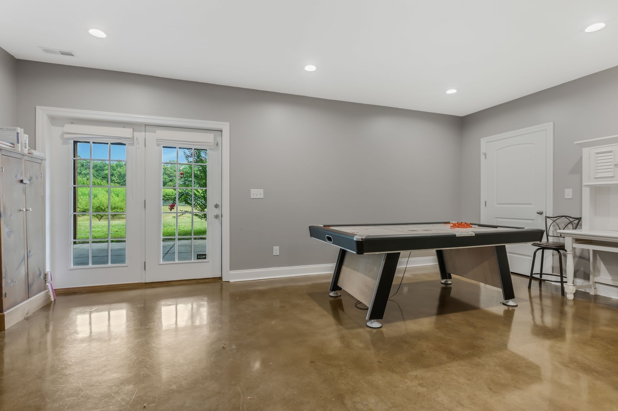 2350 Joe Brown Road Spring Hill, TN 37174 - Photo 43 of 80 a room with furniture and a wooden floor