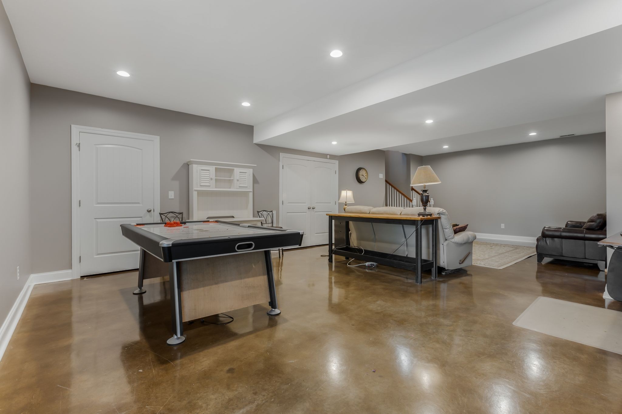 2350 Joe Brown Road Spring Hill, TN 37174 - Photo 44 of 80 a living room with furniture a rug and a table