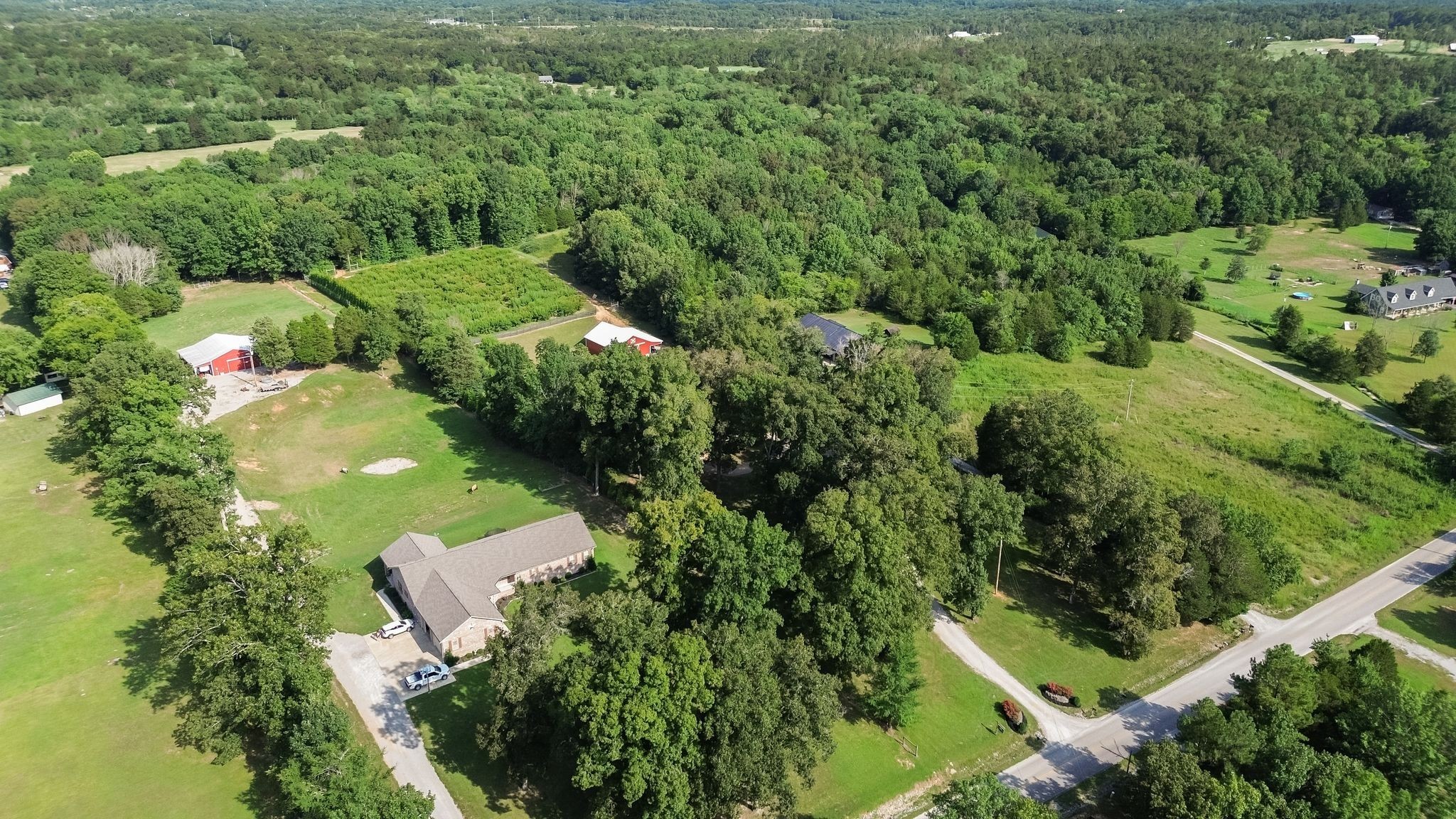 2350 Joe Brown Road Spring Hill, TN 37174 - Photo 75 of 80 an aerial view of residential house with outdoor space and trees all around