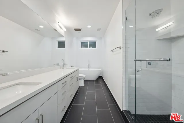 a view of a livingroom with wooden floor