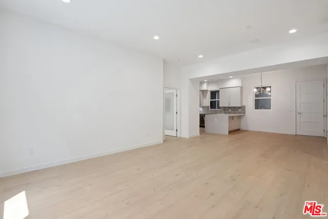 a view of a kitchen with a sink