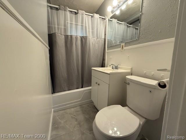 26174 Kitch Street Inkster, MI 48141 - Photo 8 of 8 Bathroom featuring a white vanity with integrated sink, chrome faucet, and storage cabinetry