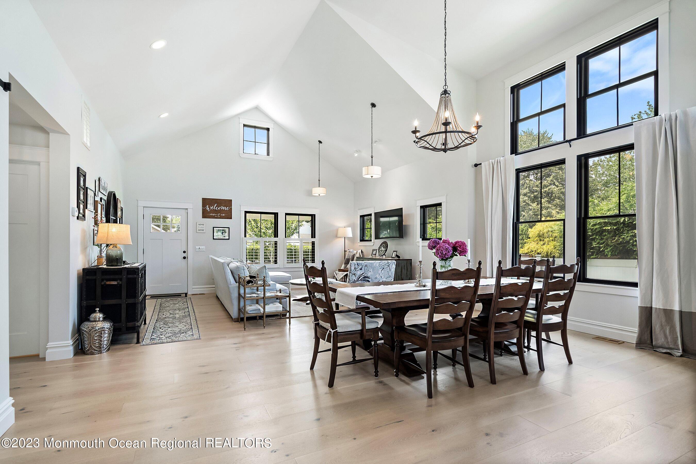 2502 Kipling Avenue Spring Lake, NJ 07762 - Photo 12 of 43 a view of a dining room with furniture window and wooden floor