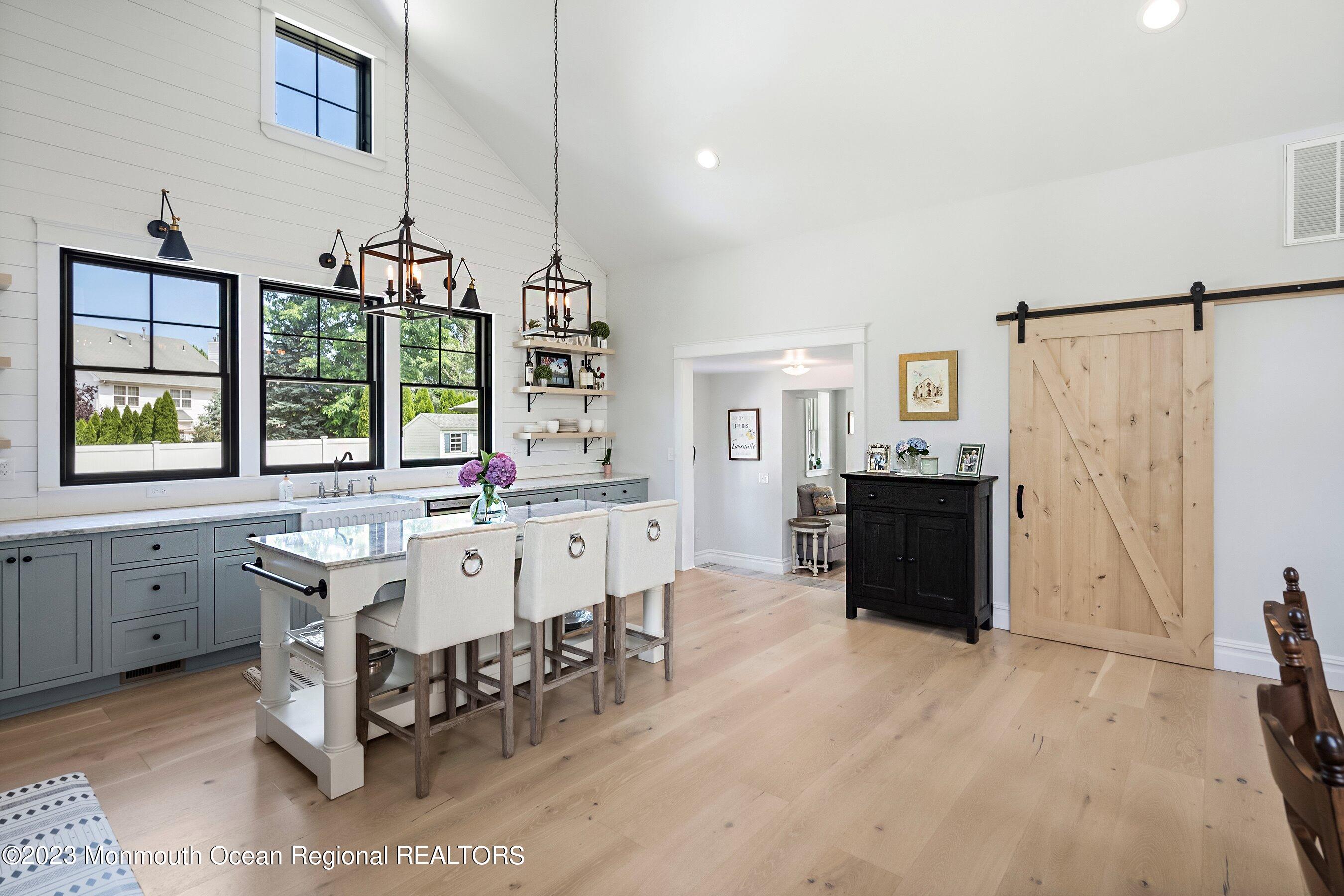 2502 Kipling Avenue Spring Lake, NJ 07762 - Photo 15 of 43 a large white kitchen with a large window