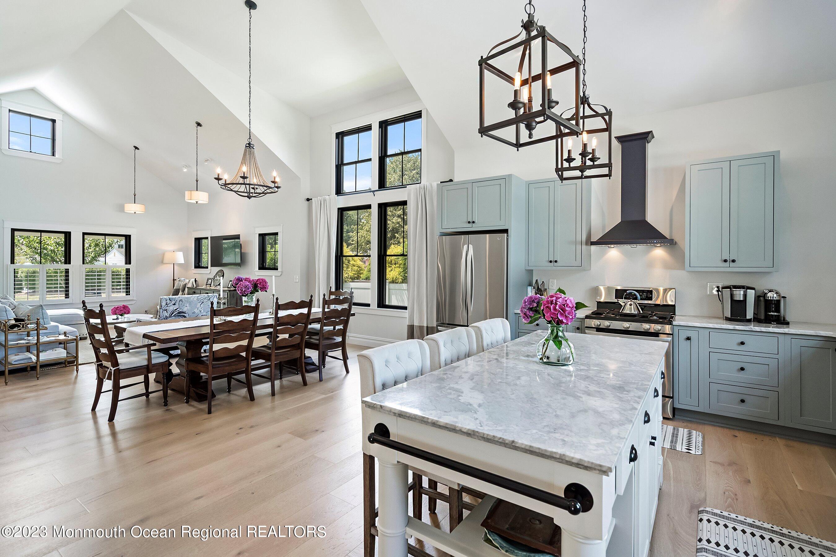 2502 Kipling Avenue Spring Lake, NJ 07762 - Photo 18 of 43 a kitchen with stainless steel appliances granite countertop a stove and white cabinets