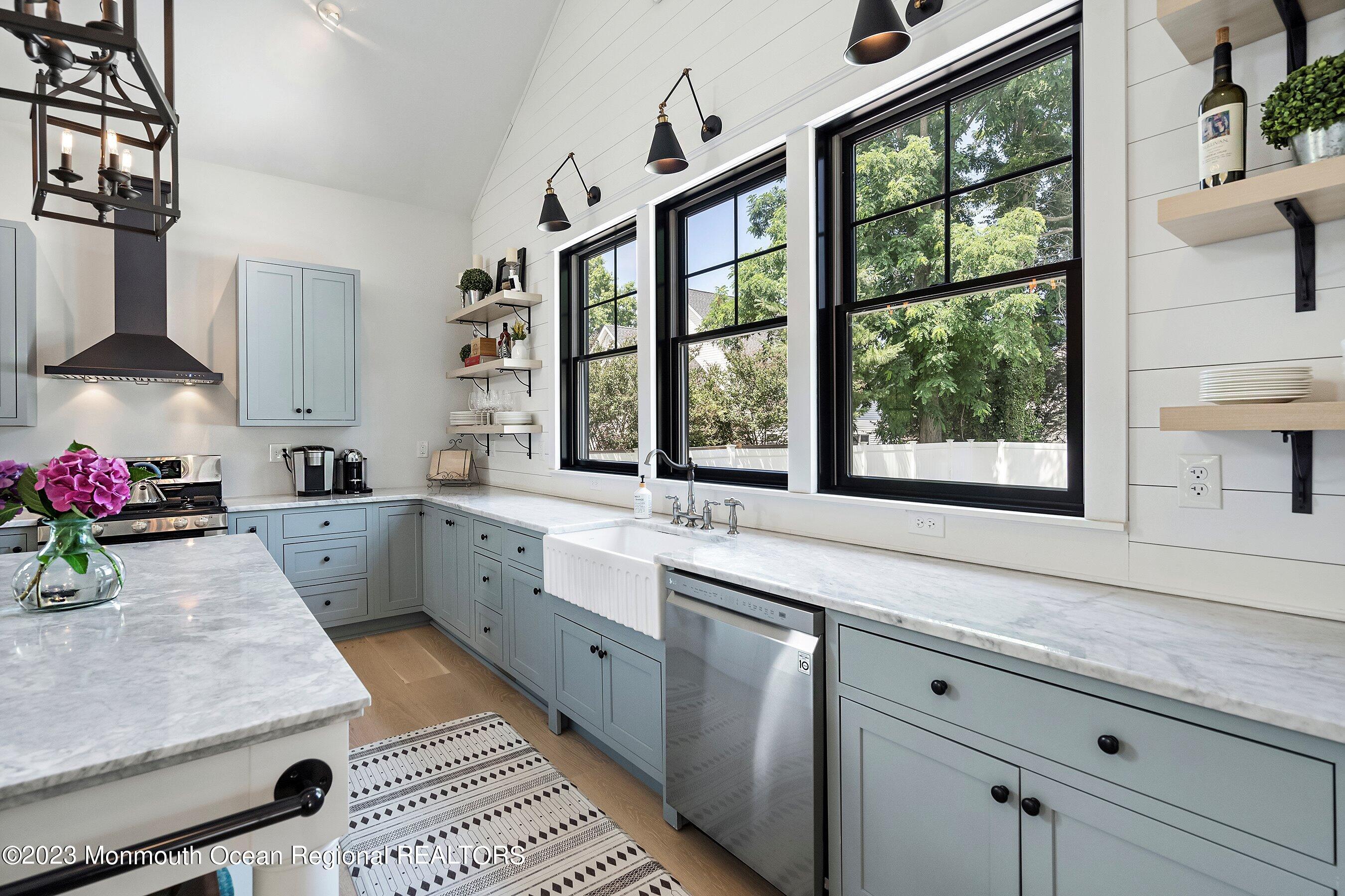 2502 Kipling Avenue Spring Lake, NJ 07762 - Photo 19 of 43 a kitchen that has a sink and a stove