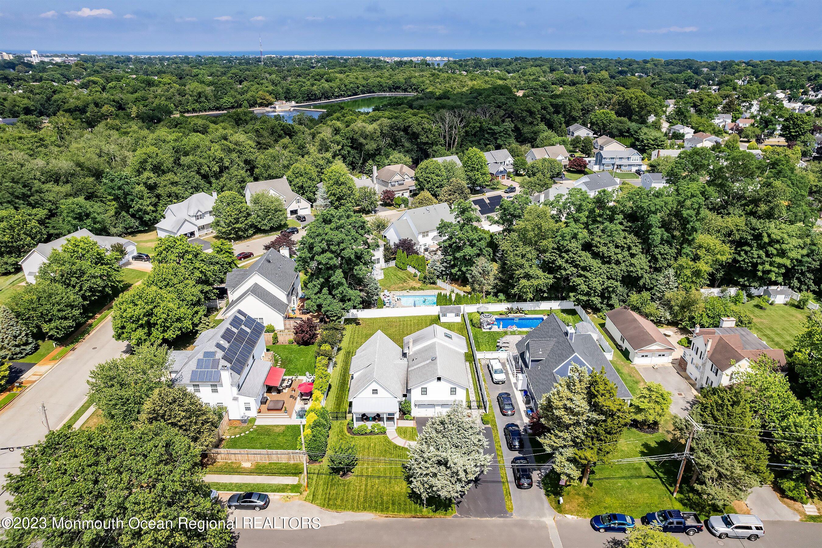 2502 Kipling Avenue Spring Lake, NJ 07762 - Photo 2 of 43 an aerial view of residential house with outdoor space and swimming pool