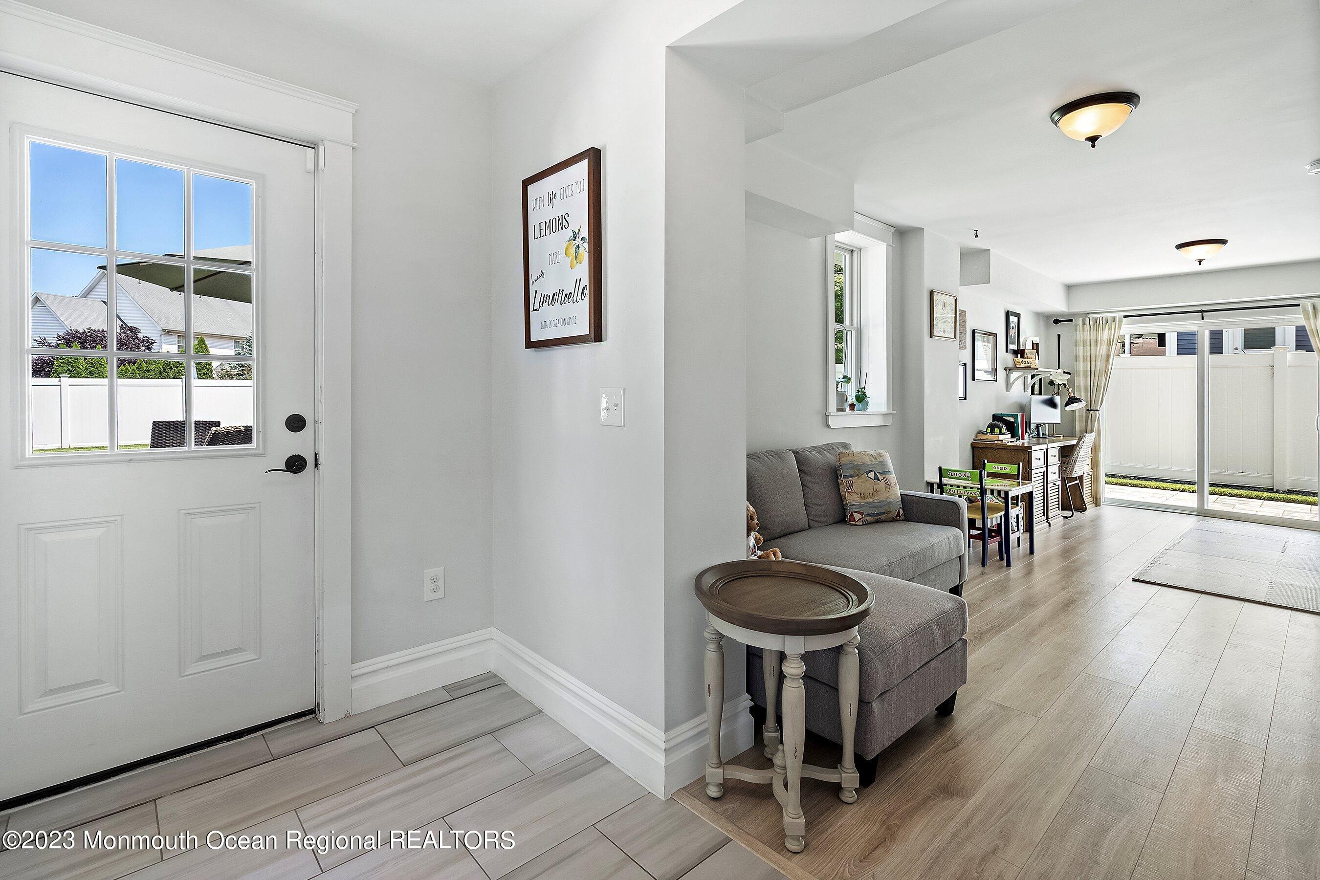 2502 Kipling Avenue Spring Lake, NJ 07762 - Photo 22 of 43 a living room with furniture and a table