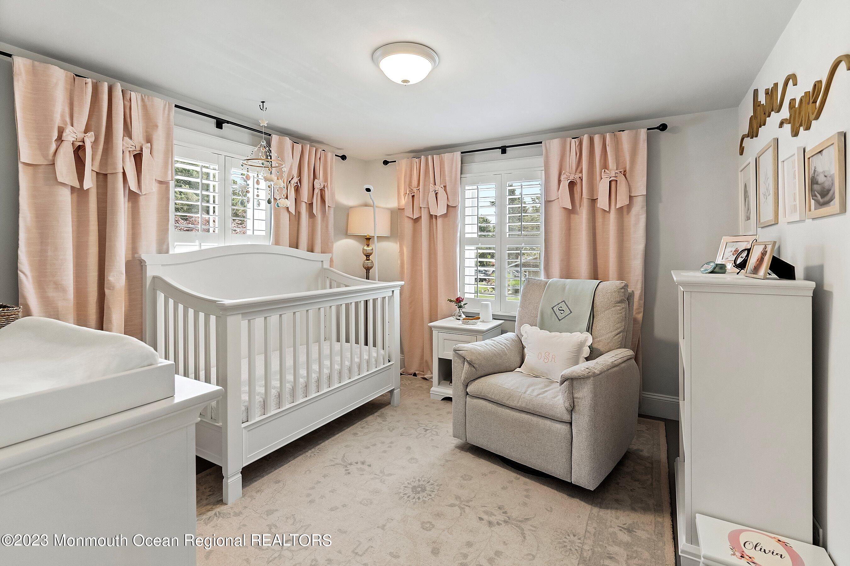 2502 Kipling Avenue Spring Lake, NJ 07762 - Photo 28 of 43 a bedroom with furniture and a large window
