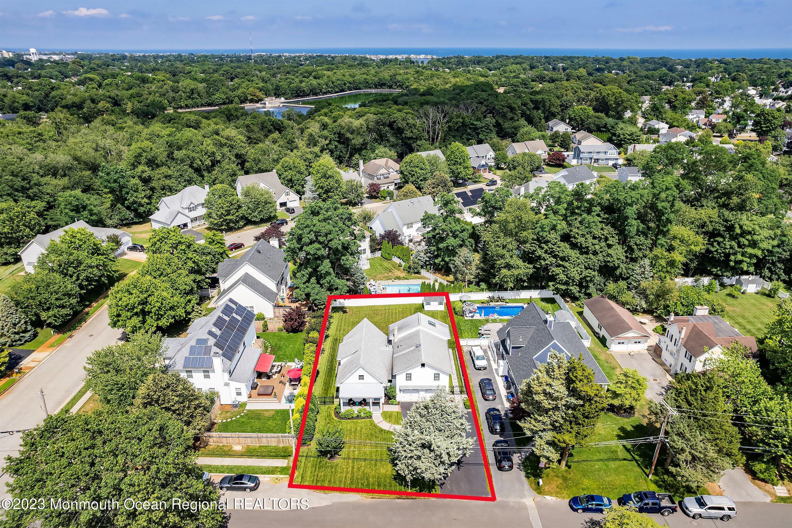 2502 Kipling Avenue Spring Lake, NJ 07762 - Photo 3 of 43 an aerial view of a residential houses with outdoor space and street view