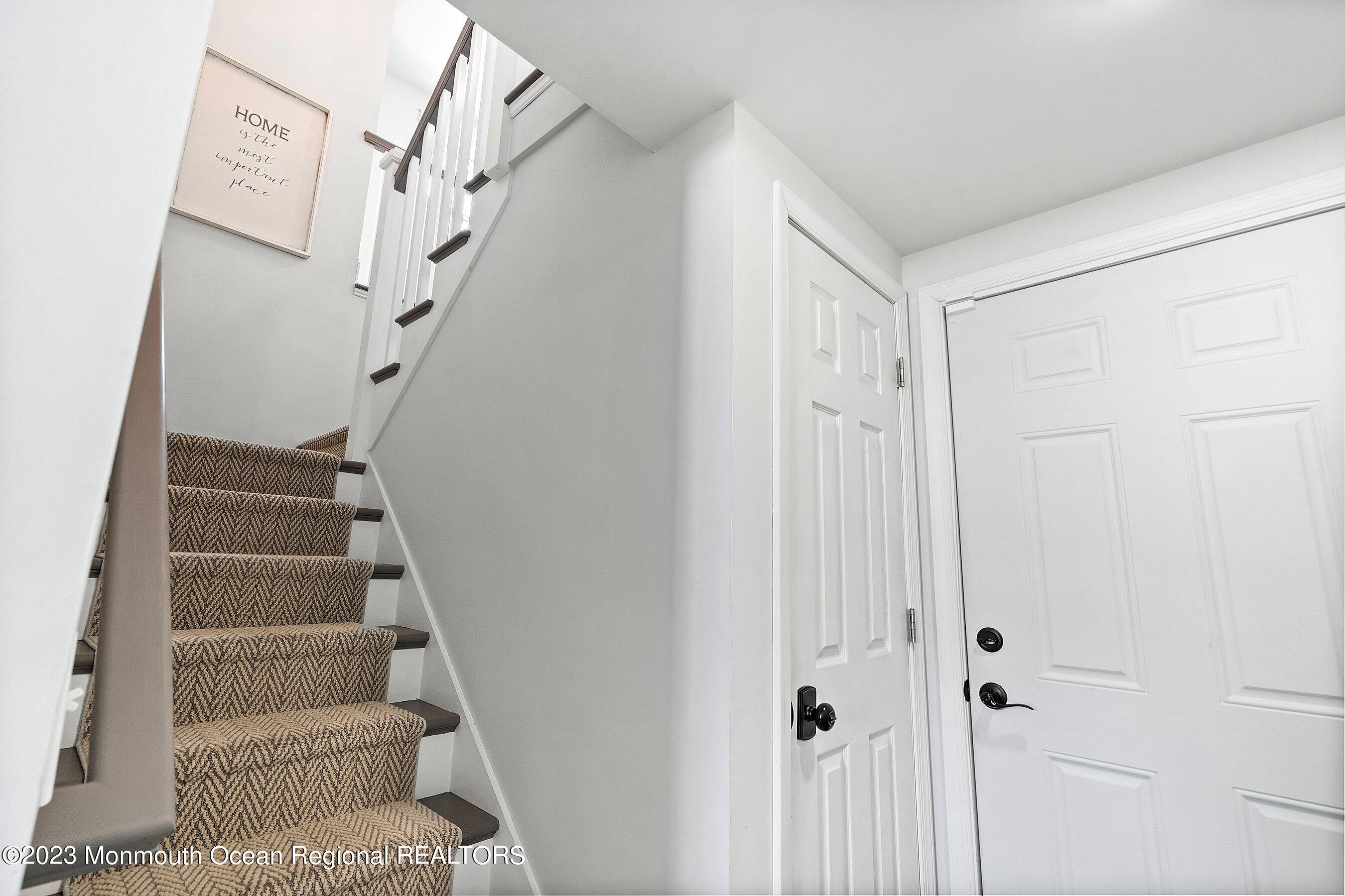2502 Kipling Avenue Spring Lake, NJ 07762 - Photo 34 of 43 a view of staircase with white walls and white walls