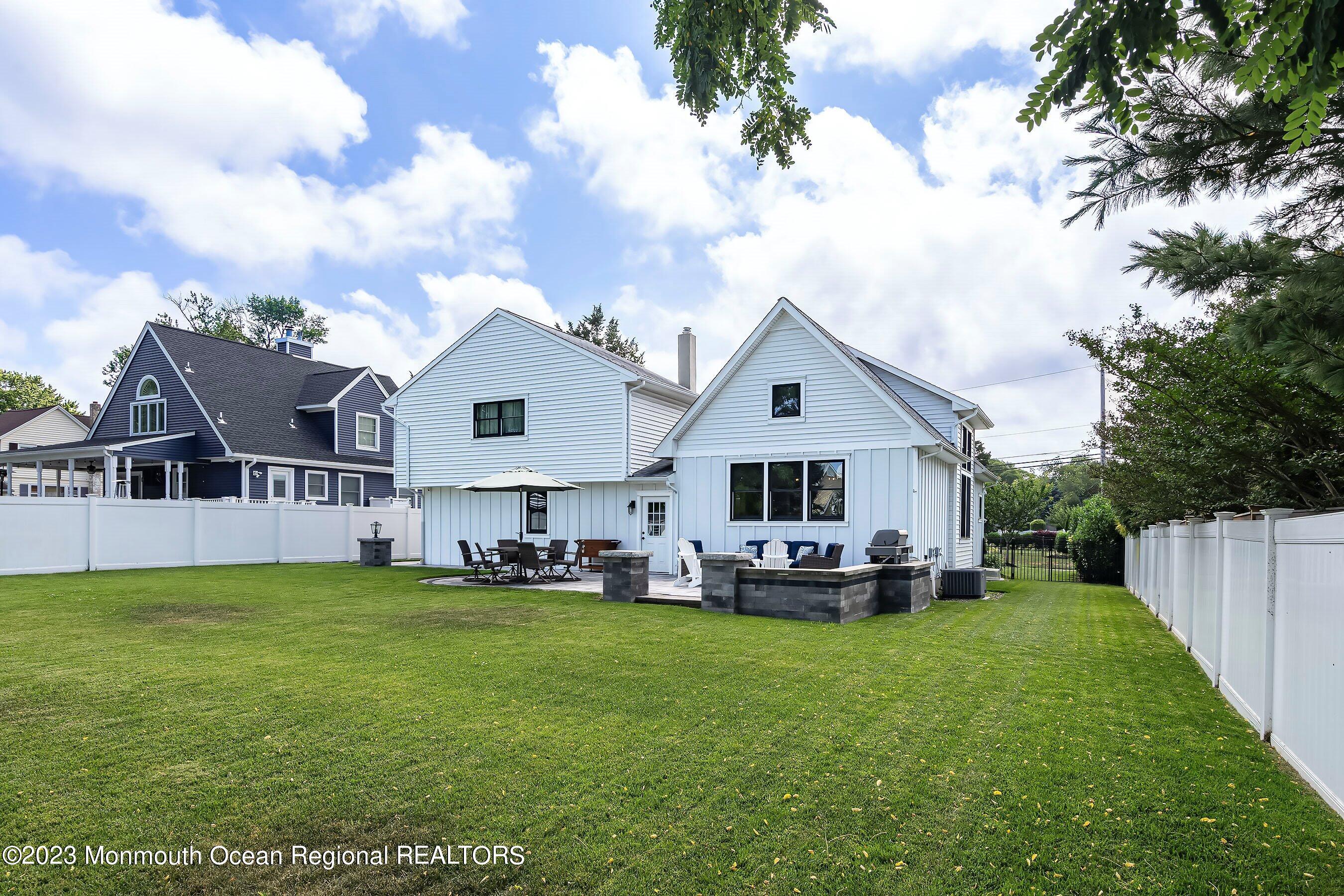 2502 Kipling Avenue Spring Lake, NJ 07762 - Photo 40 of 43 a front view of house with garden