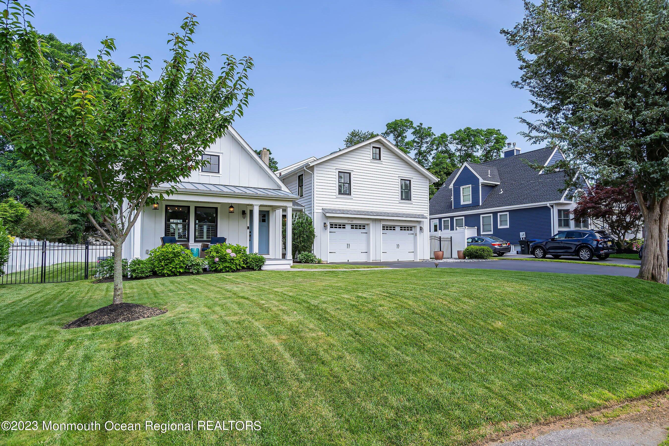 2502 Kipling Avenue Spring Lake, NJ 07762 - Photo 4 of 43 a view of a house with a big yard and large trees