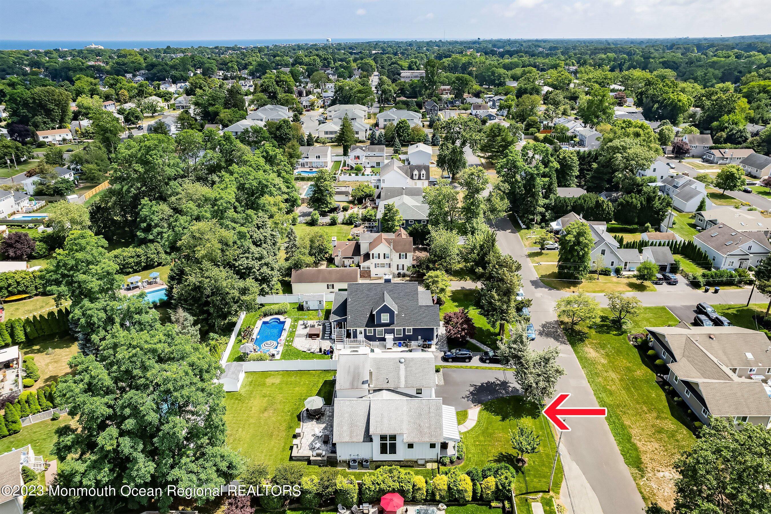 2502 Kipling Avenue Spring Lake, NJ 07762 - Photo 42 of 43 an aerial view of residential houses with outdoor space and trees