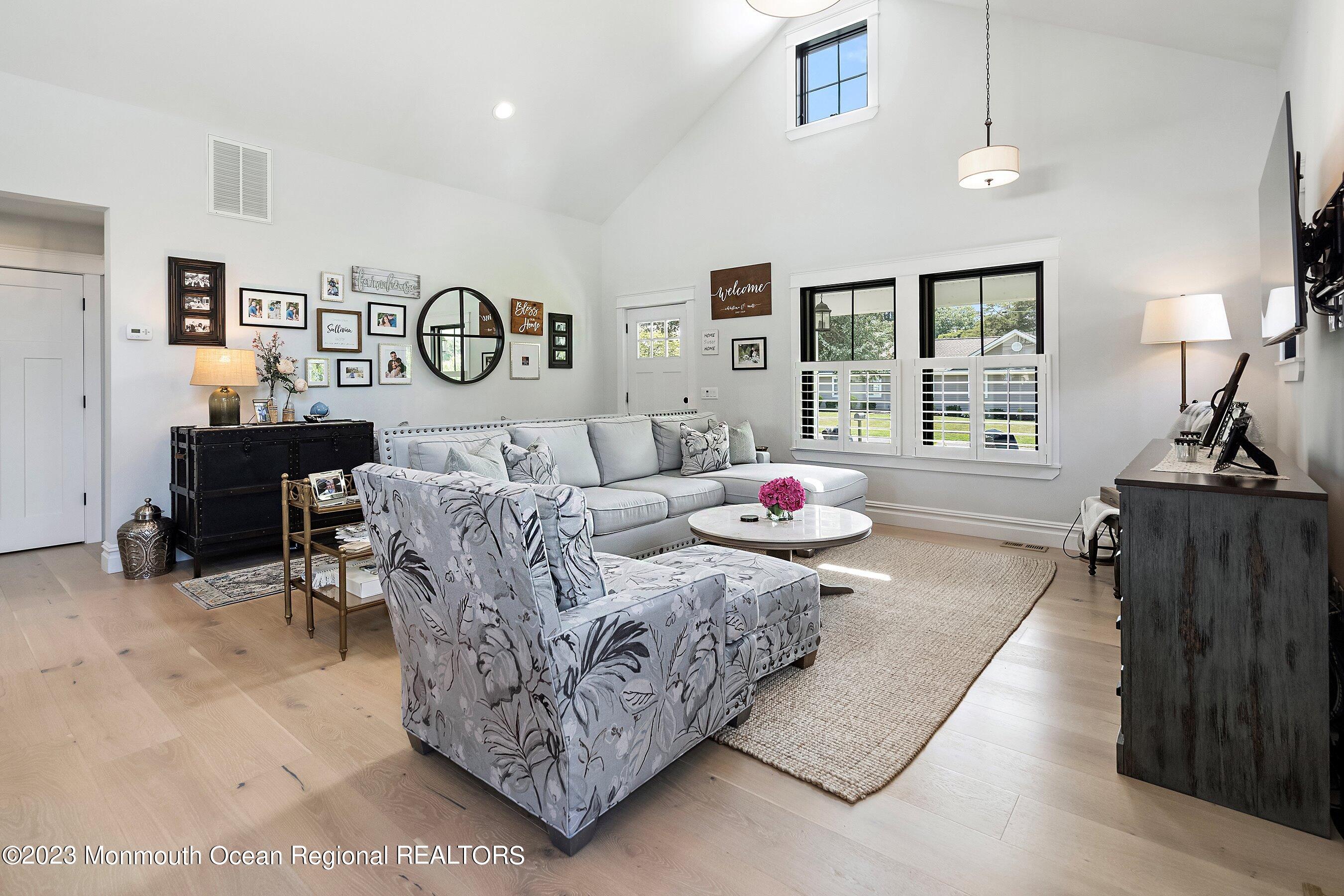 2502 Kipling Avenue Spring Lake, NJ 07762 - Photo 10 of 43 a living room with furniture and a flat screen tv