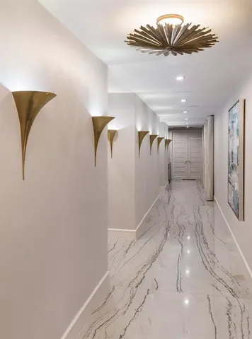 a spacious bedroom with a bed and large window