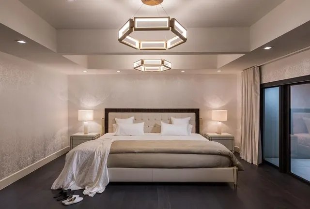 a bathroom with a toilet sink and shower