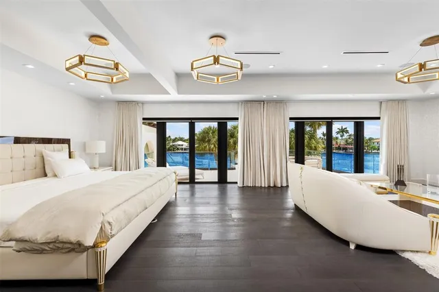 a swimming pool with outdoor seating and yard