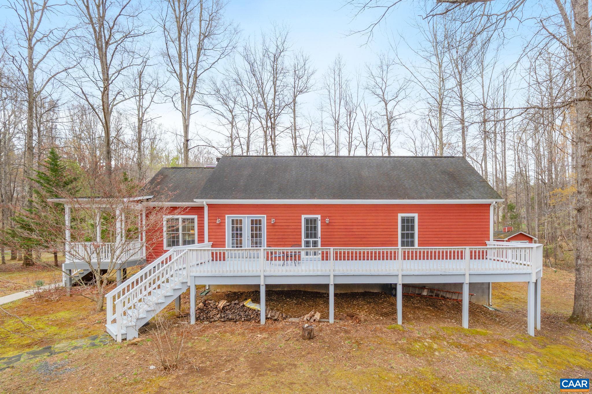 500 Rhue Hollow Road Roseland, VA 22967 - Photo 2 of 34 a view of a house with a wooden fence