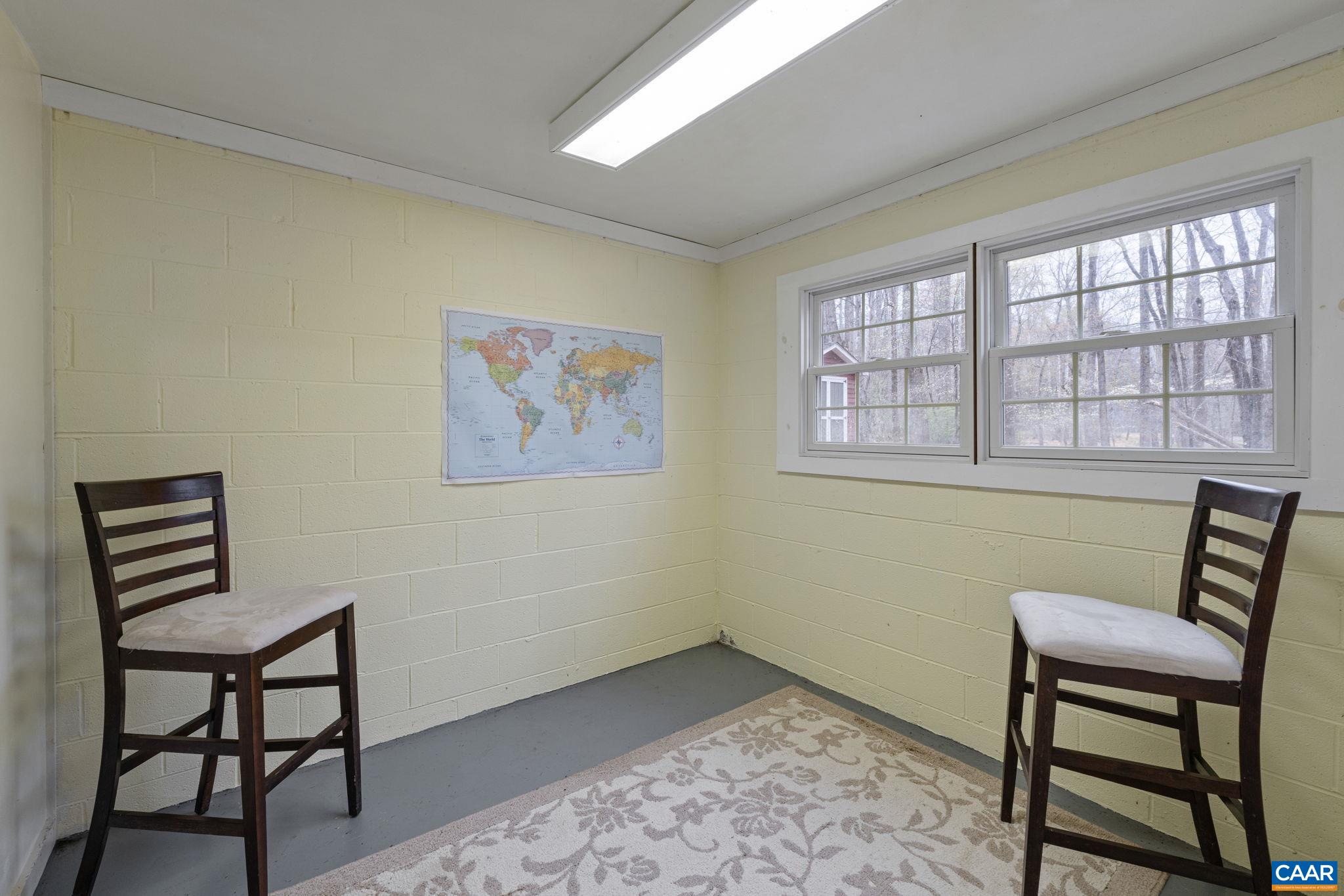 500 Rhue Hollow Road Roseland, VA 22967 - Photo 22 of 34 a workspace room with furniture and a window