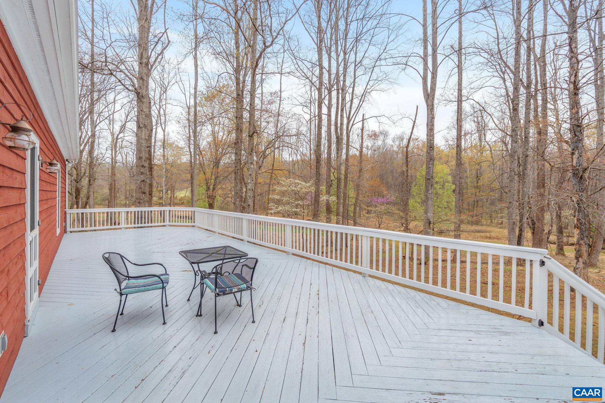500 Rhue Hollow Road Roseland, VA 22967 - Photo 23 of 34 a view of a chairs and table on the wooden floor