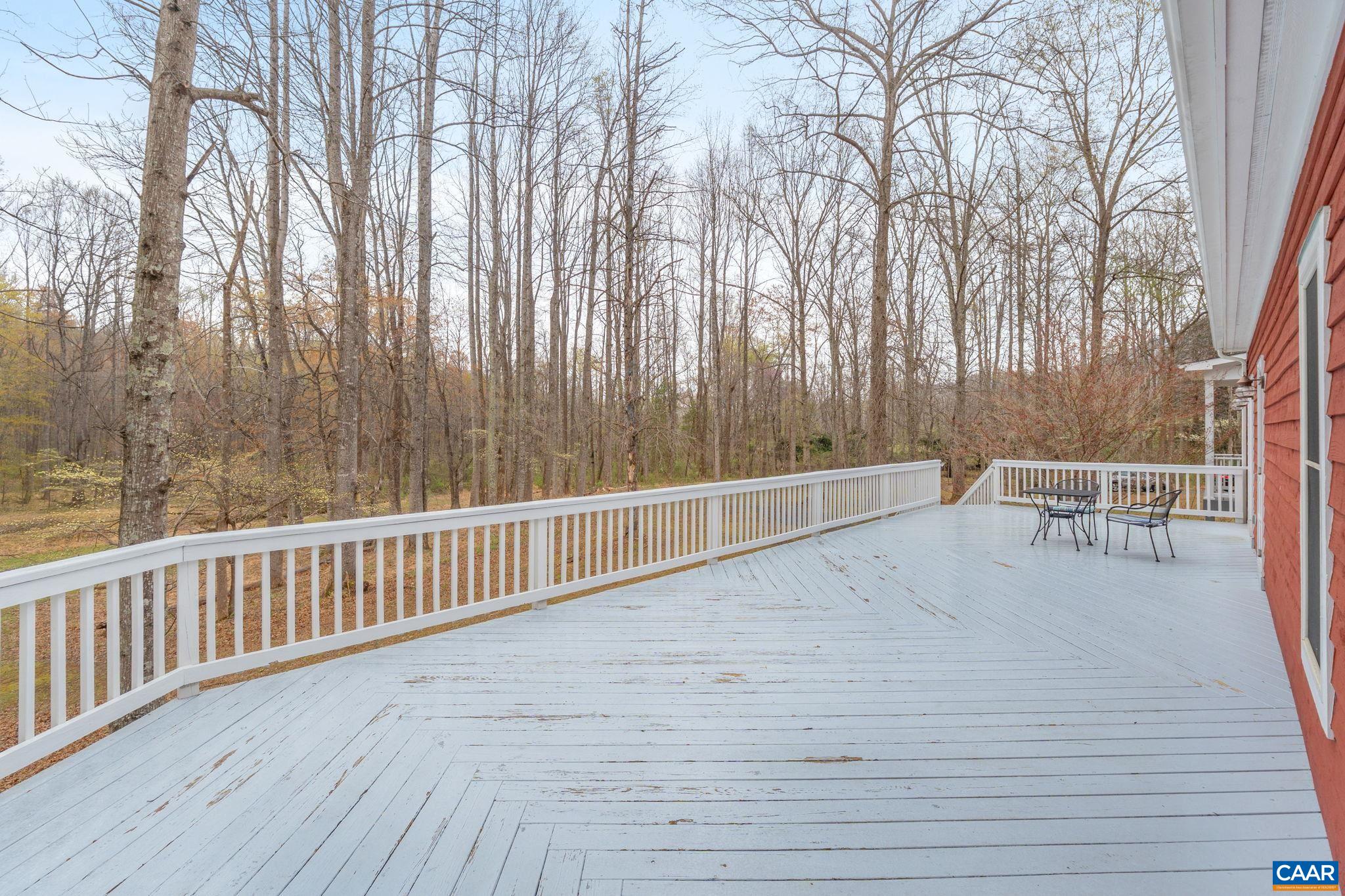 500 Rhue Hollow Road Roseland, VA 22967 - Photo 24 of 34 a view of a chairs and table on the wooden floor