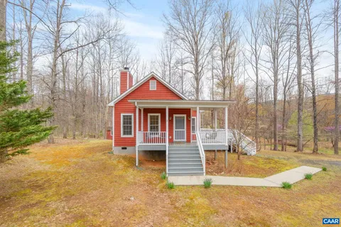 a house with trees in front of it
