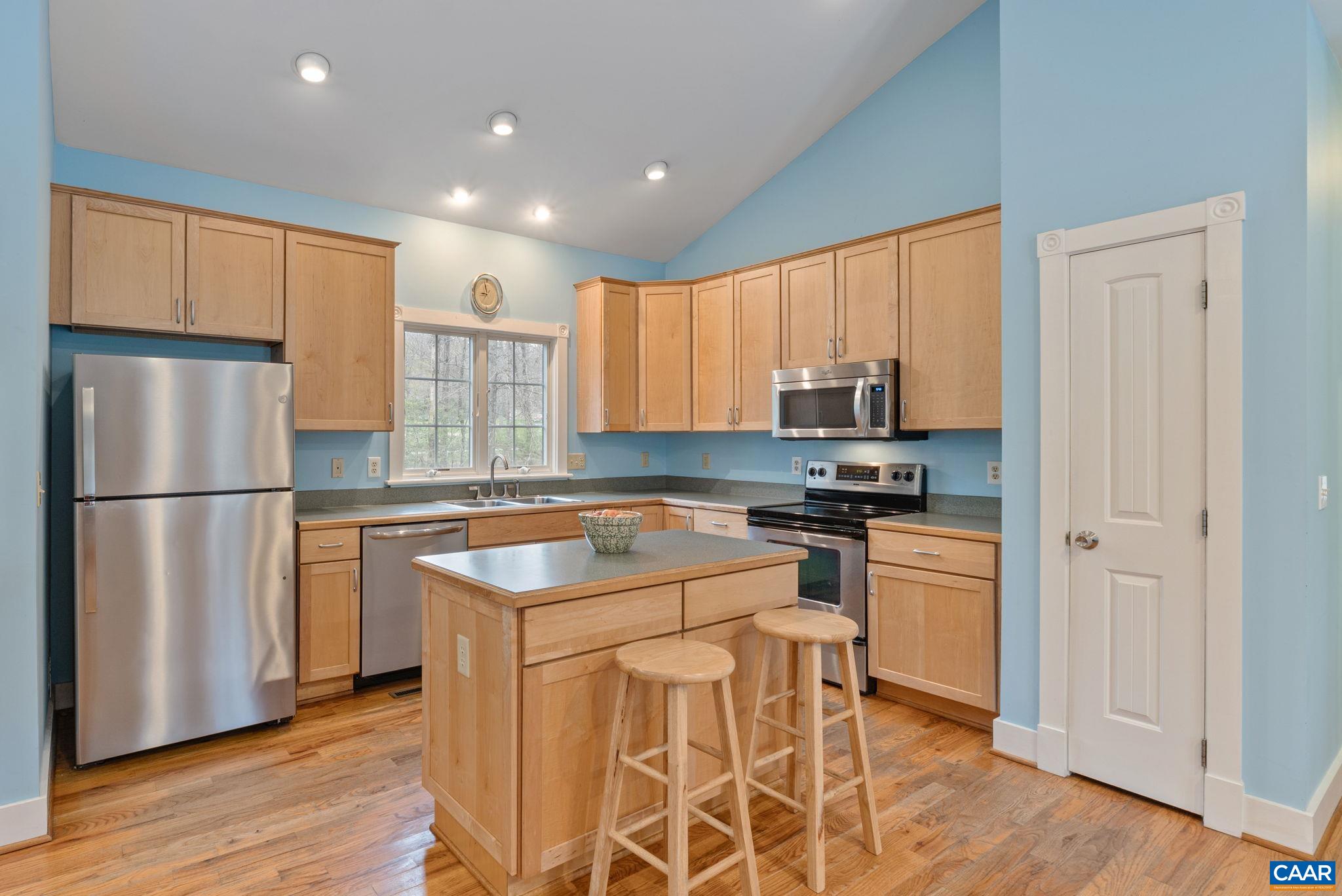 500 Rhue Hollow Road Roseland, VA 22967 - Photo 34 of 34 a kitchen with stainless steel appliances granite countertop a refrigerator stove microwave and sink