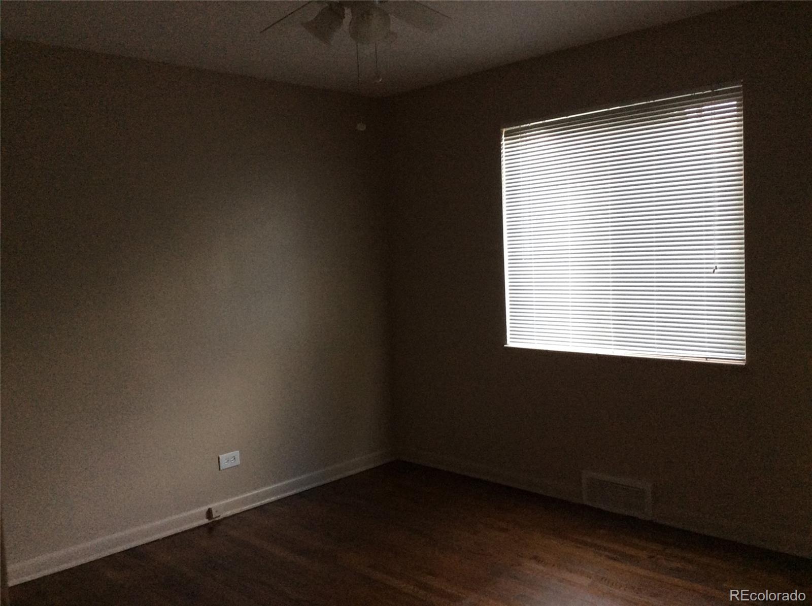 380 South Decatur Street Denver, CO 80219 - Photo 12 of 12 an empty room with a window