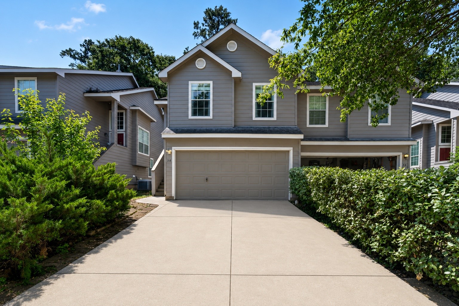 38 Musgrove Place Spring, TX 77382 - Photo 1 of 36 New listing townhouse with charming gables, spacious two-car garage, and manicured landscaping on a quiet drive.