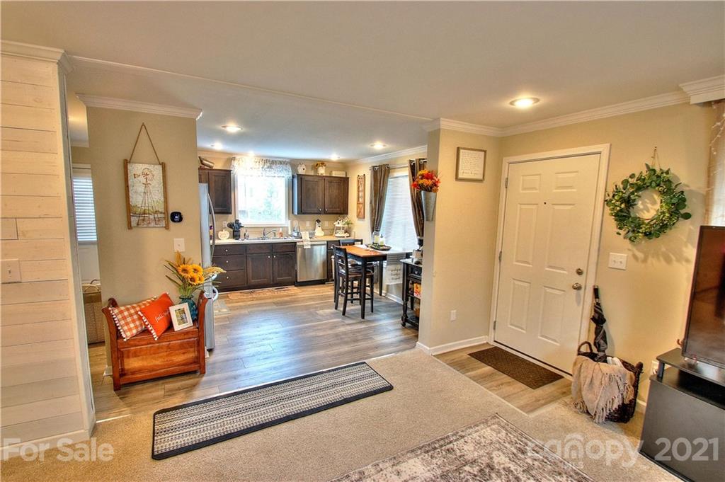 43 Janie Road, Unit 14 Clyde, NC 28721 - Photo 6 of 35 a living room with furniture and a table