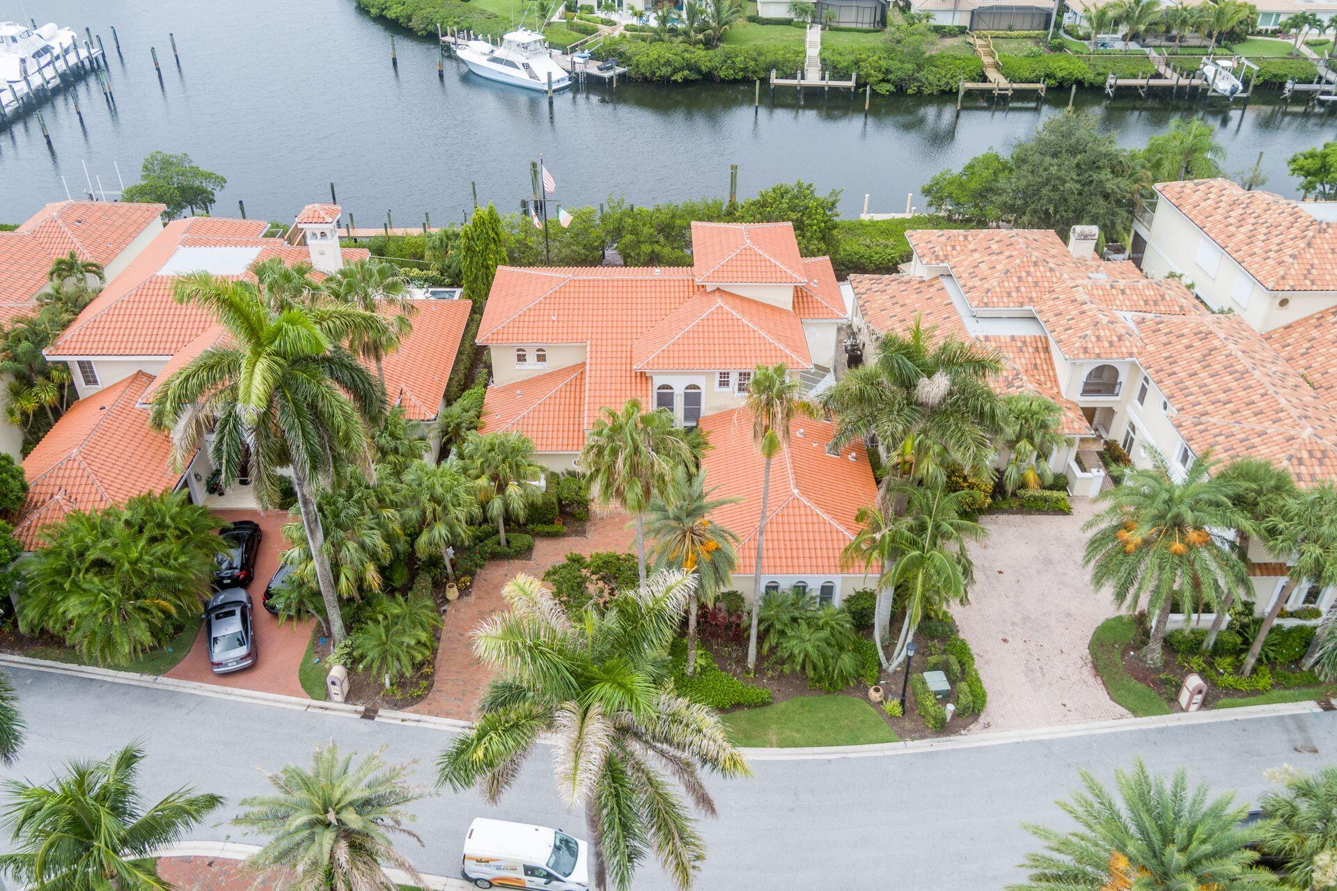 3330 Bridgegate Drive Jupiter, FL 33477 - Photo 29 of 39 an aerial view of a house with outdoor space and lake view