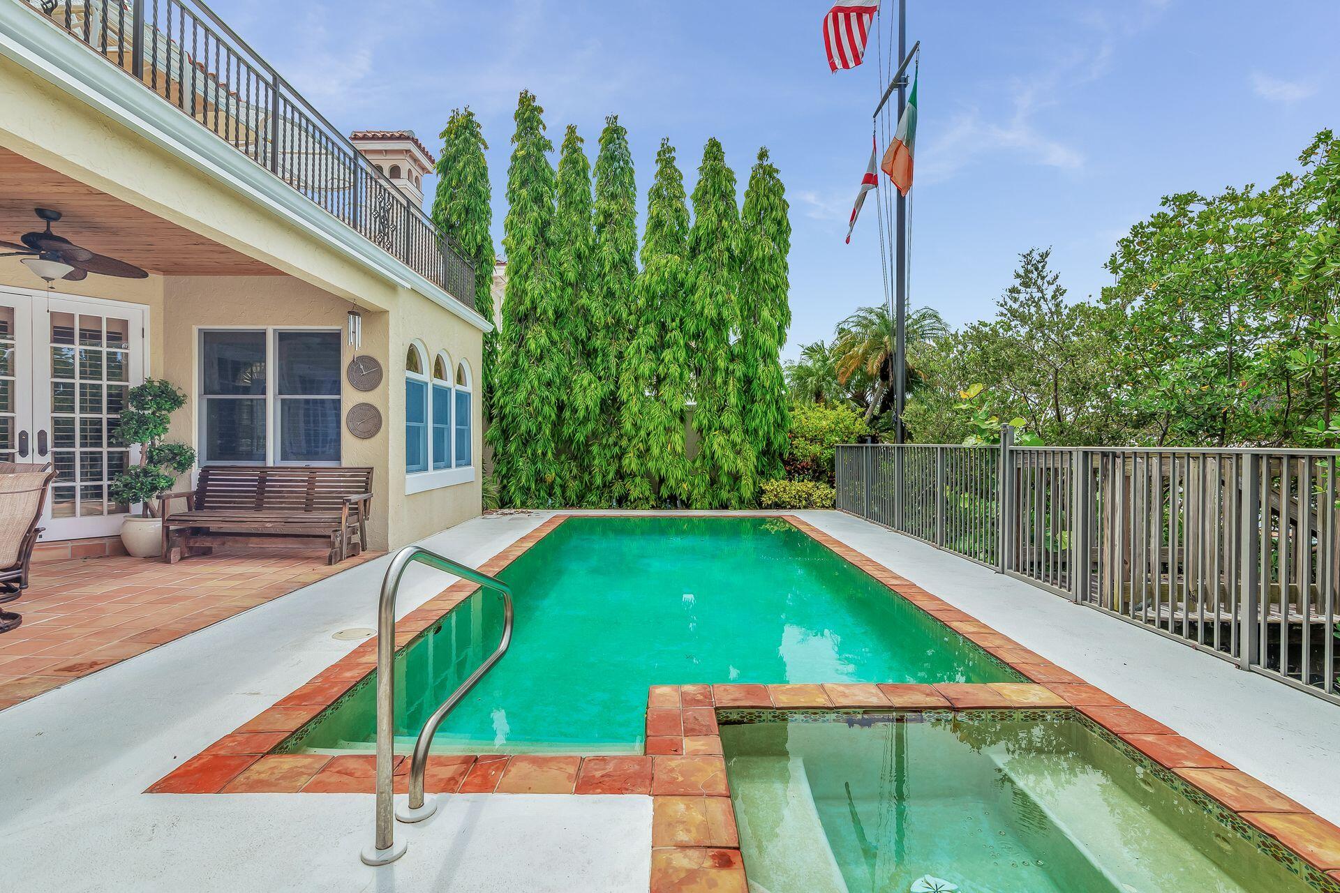 3330 Bridgegate Drive Jupiter, FL 33477 - Photo 32 of 39 swimming pool with an outdoor seating