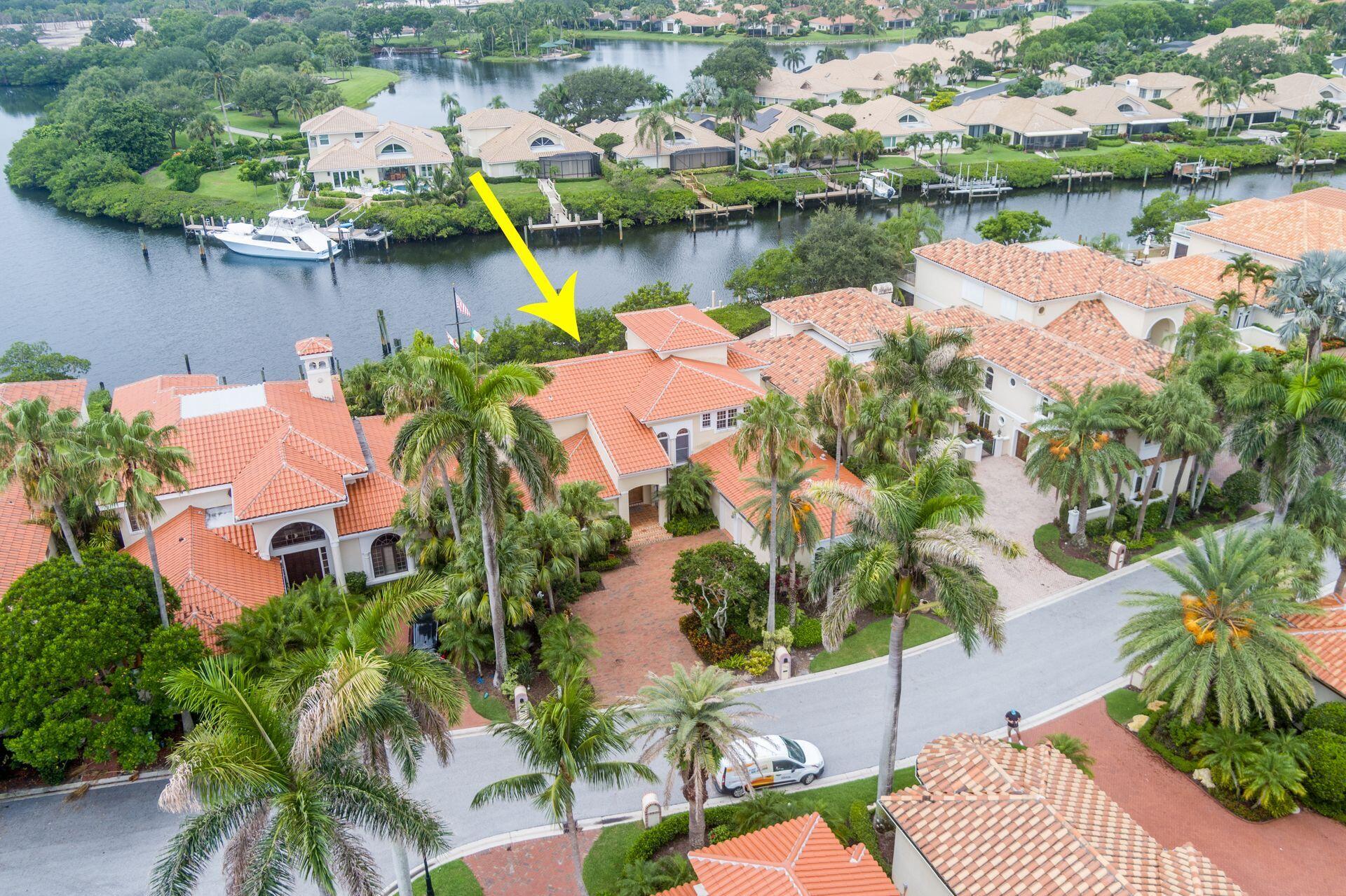 3330 Bridgegate Drive Jupiter, FL 33477 - Photo 35 of 39 an aerial view of a house with outdoor space lake view and lake view