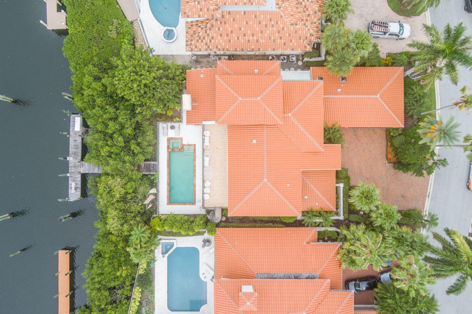 3330 Bridgegate Drive Jupiter, FL 33477 - Photo 39 of 39 aerial view of a house with large trees